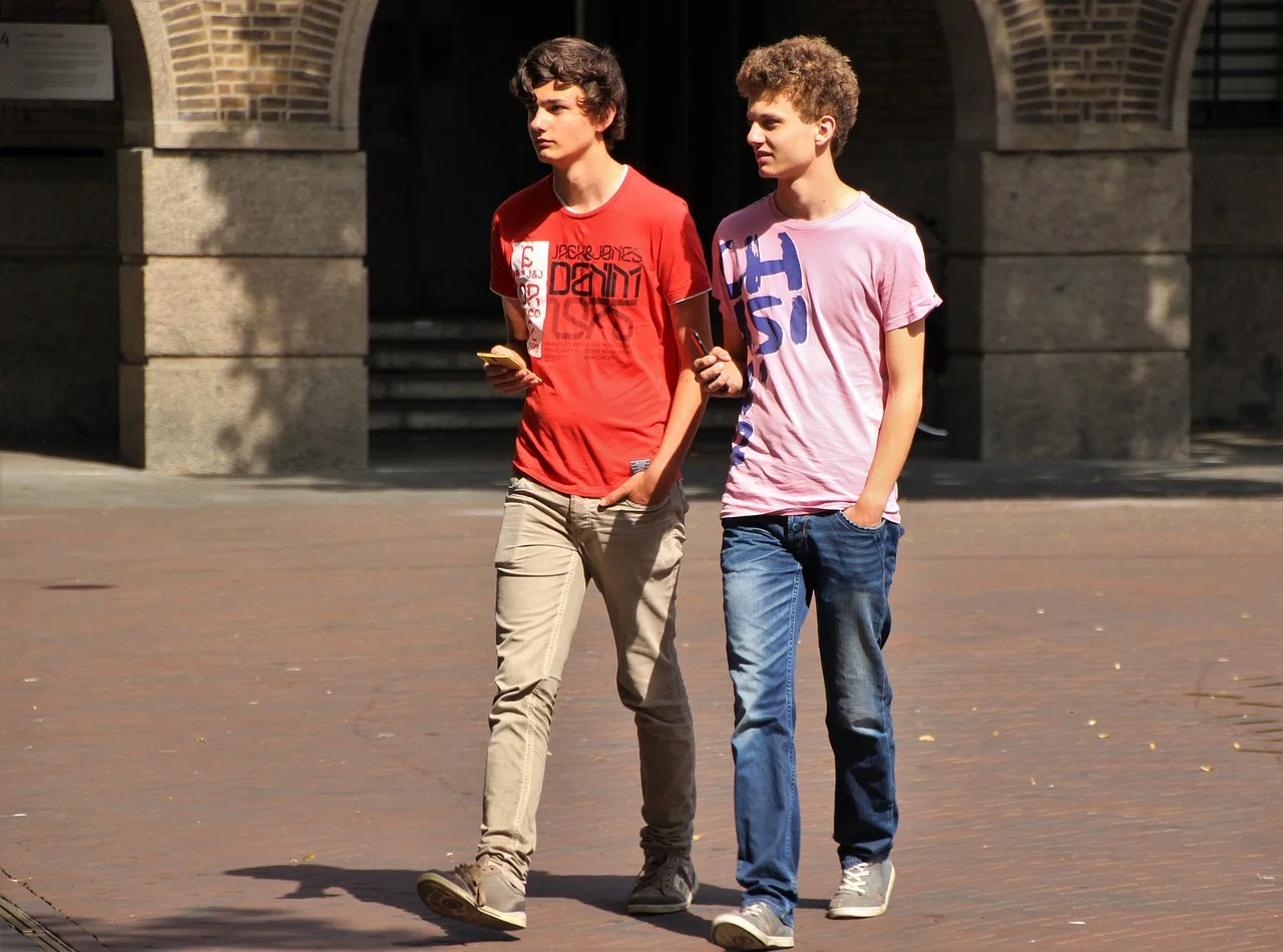 A sleek, minimalist, abstract client logo rendered in a metallic or glowing cyber-style.